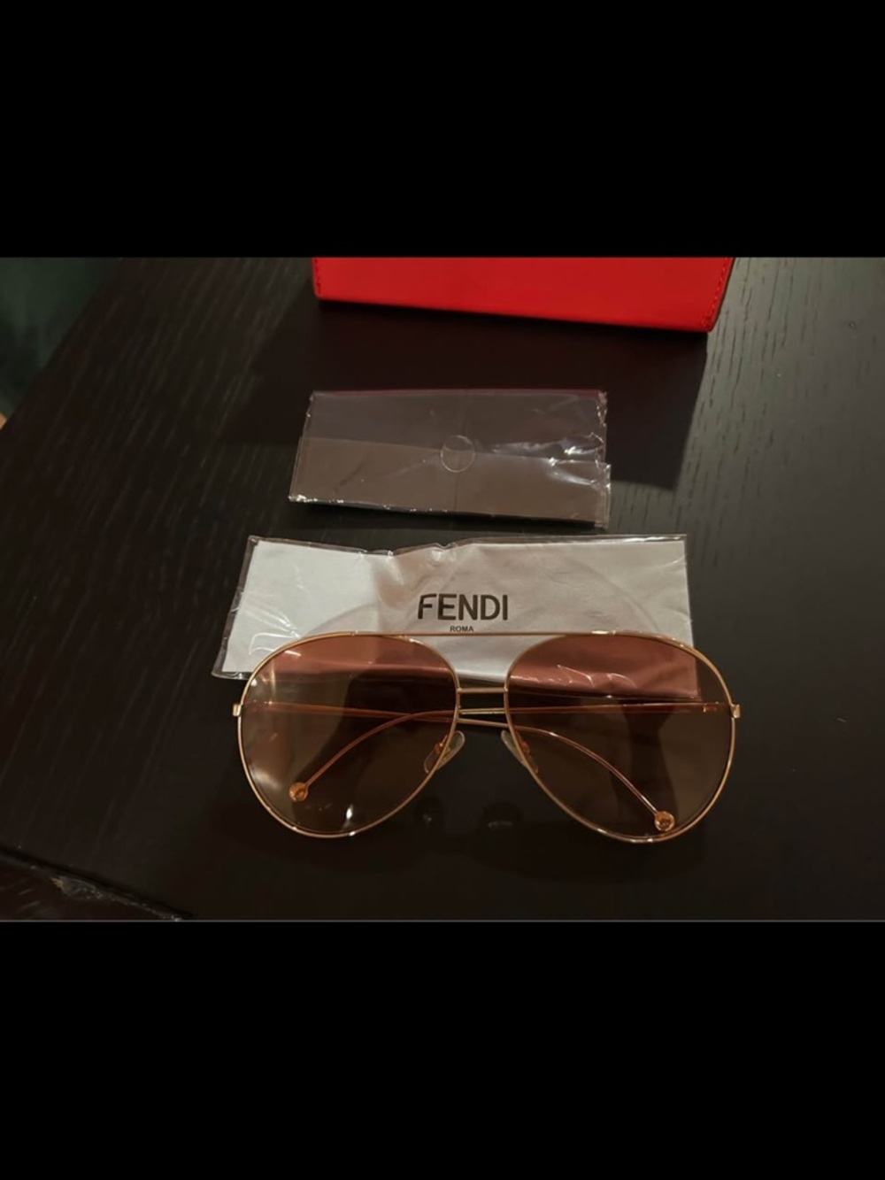 Fendi Gold Frame Sunglasses with Pink Lenses